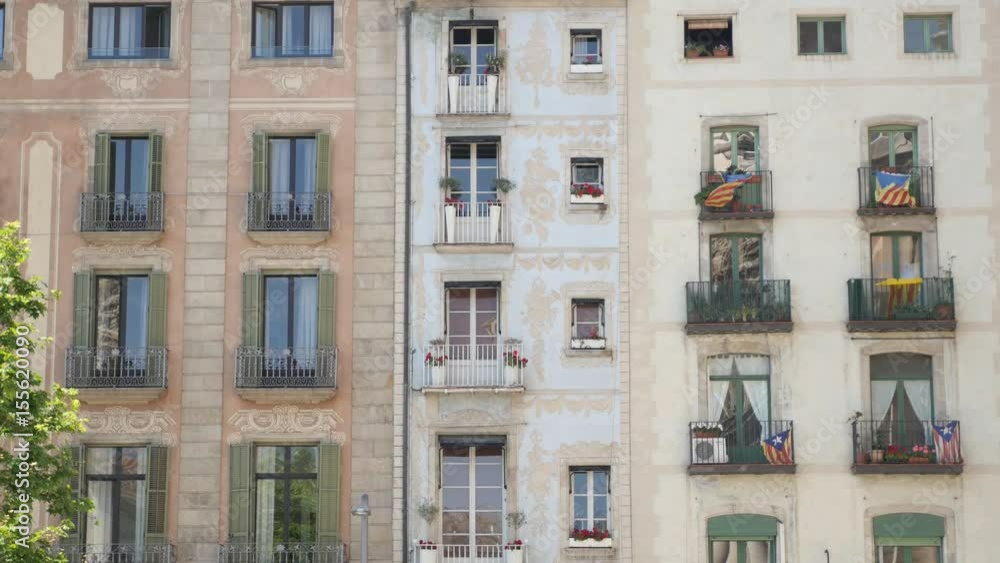 Barcelona apartments, flags hanging off balcony Barcelona apartments, flags hanging off balcony