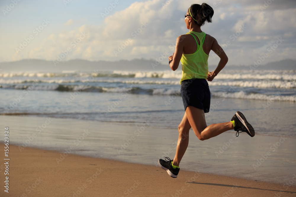 healthy lifestyle young fitness woman running on sunrise beach healthy lifestyle young fitness woman running on sunrise beach