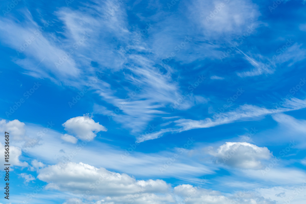Blue sky with sculpted clouds on the background Blue sky with sculpted clouds on the background