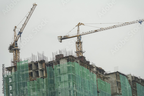 Fotografía high rise condominium buildings construction site.