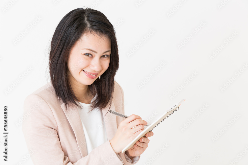 メモをする女性　ビジネス