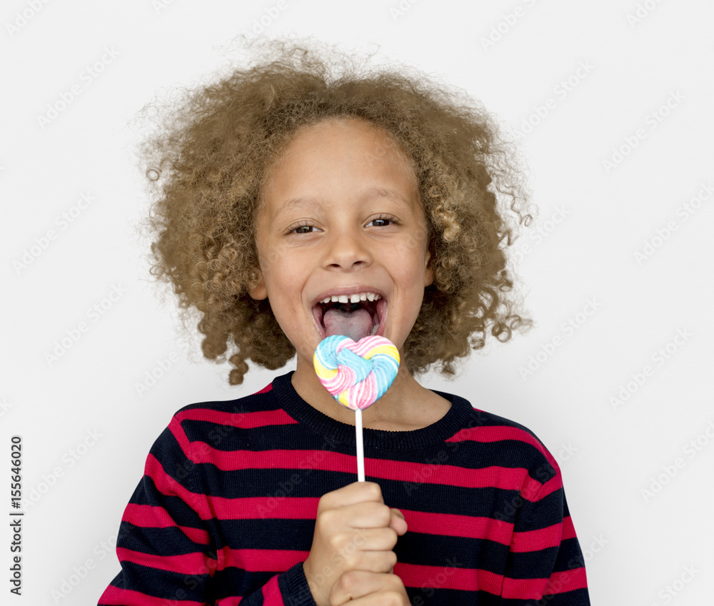 Little Boy Eating Lollipop Candy
