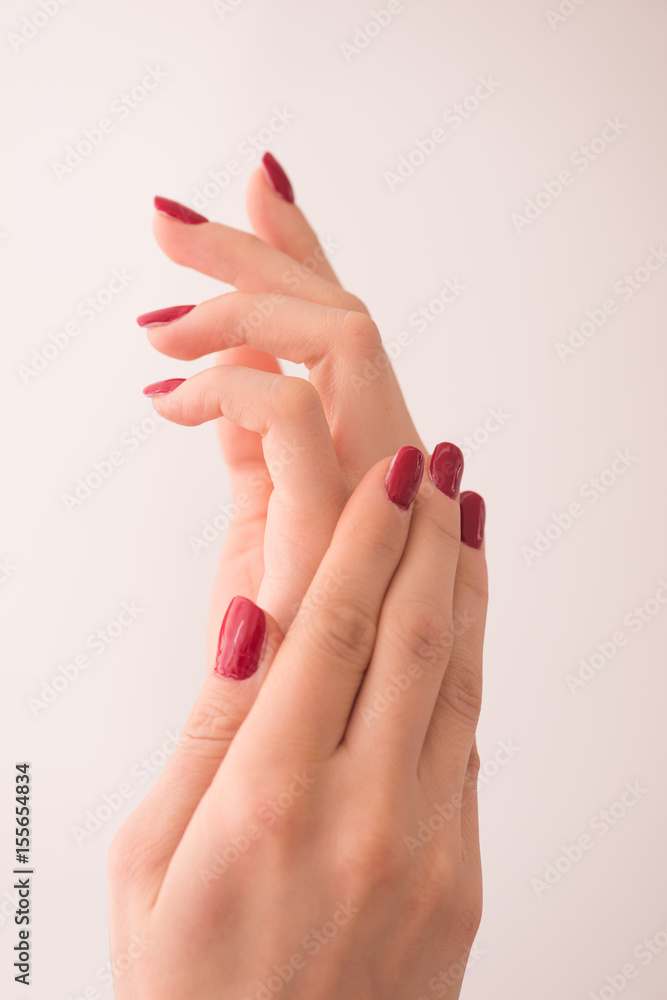 closeup of hands of a young woman closeup of hands of a young woman