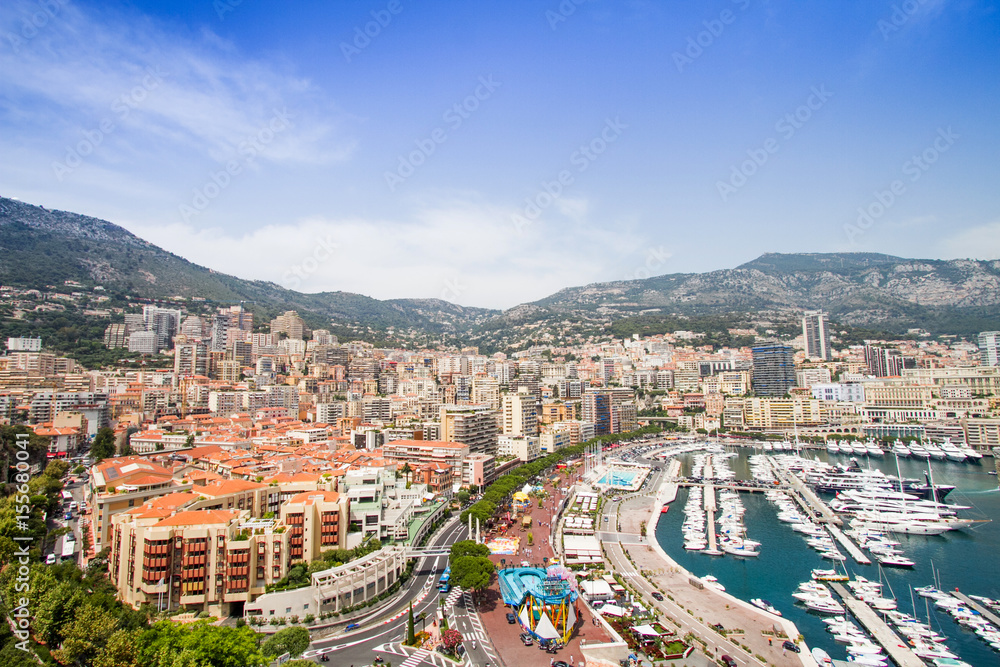Monaco Montecarlo principality aerial view cityscape. Skyscrapers, mountains and marina. Azure coast. France, Europe.