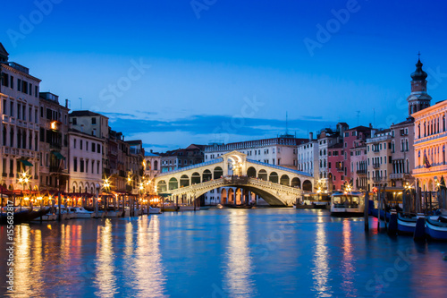 Ponte Rialto and gondola at sunset in Venice, Italy © byjeng