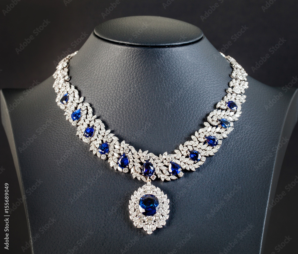 diamonds with dark blue sapphire necklace on the black background