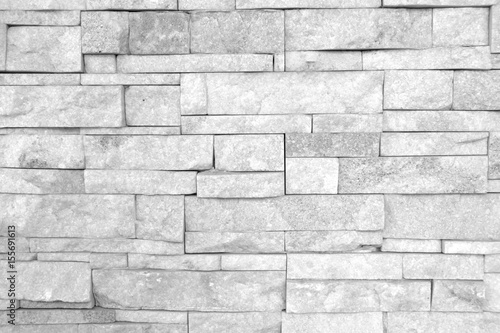 pattern of modern style design decorative uneven cracked real stone wall surface with cement