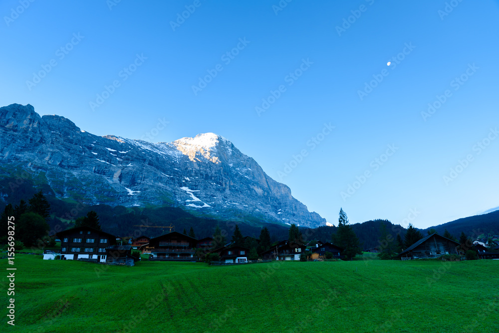 Eiger north wall - view to Eiger from Grindelwald in  in the Bernese Alps in Switzerland - travel destination in Europe