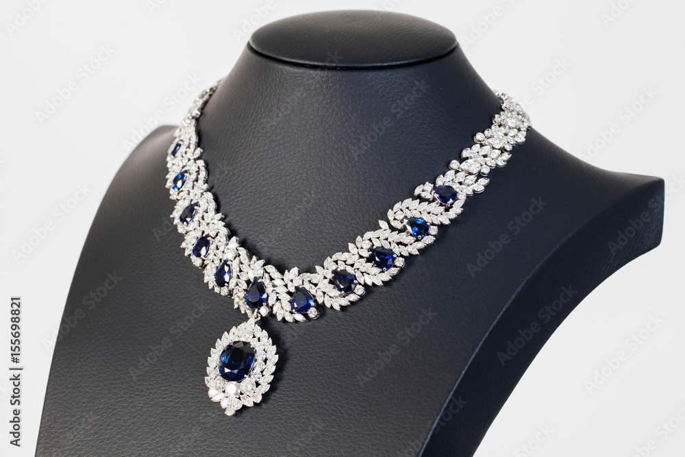 diamonds with dark blue sapphire necklace on the white background