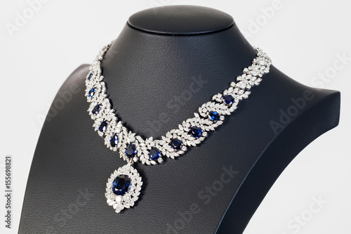 diamonds with dark blue sapphire necklace on the white background