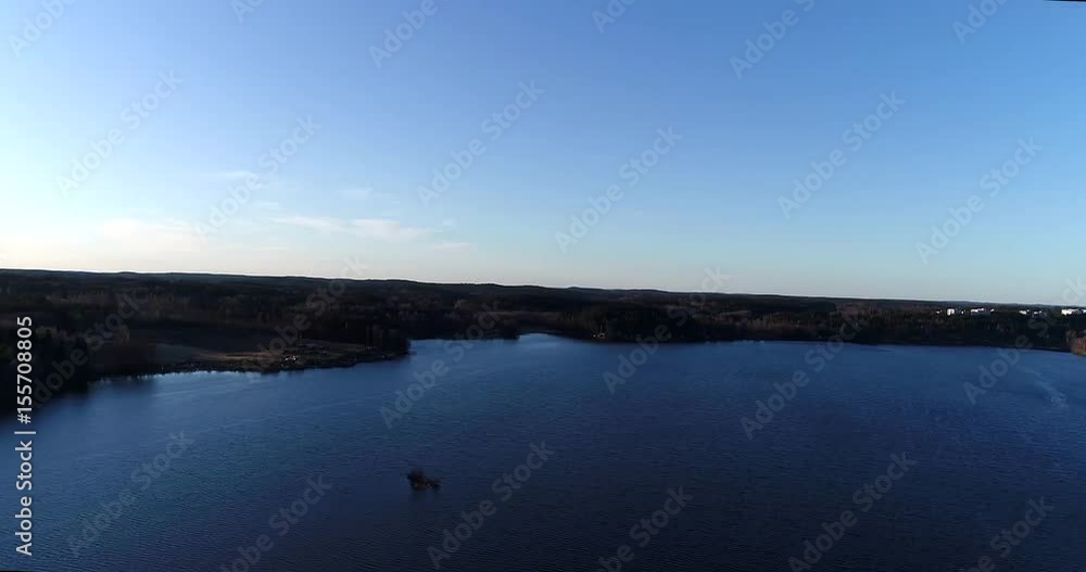 Lohjajarvi, Cinema 4k aerial 360 degree view of sunset of lohjanjärvi and lohja city, on a sunny spring evening, in Lohja, Finland Lohjajarvi, Cinema 4k aerial 360 degree view of sunset of lohjanjärvi and lohja city, on a sunny spring evening, in Lohja, Finland