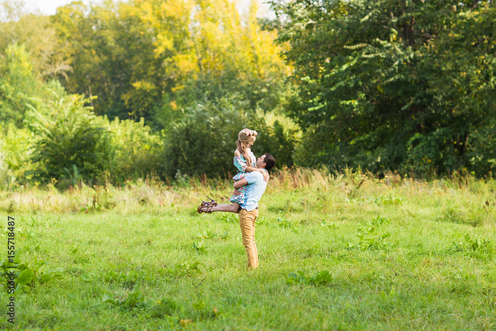 Couple embracing on nature. Young romantic man and woman standing and hugging each other with tenderness outdoors. Young love concept. Couple embracing on nature. Young romantic man and woman standing and hugging each other with tenderness outdoors. Young love concept.