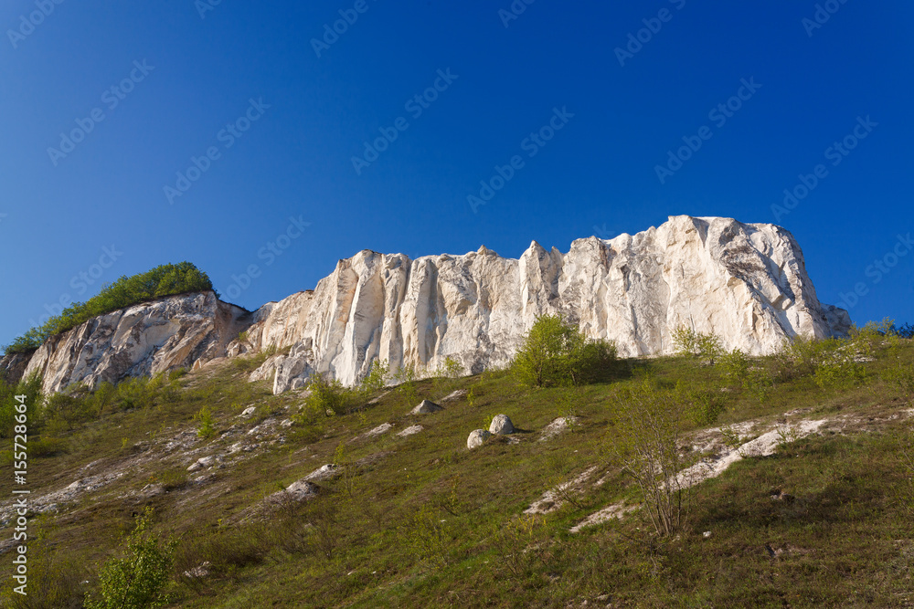 Ancient chalk mountains in central Russia. A landscape view of the peaks and hills. Ancient chalk mountains in central Russia. A landscape view of the peaks and hills.