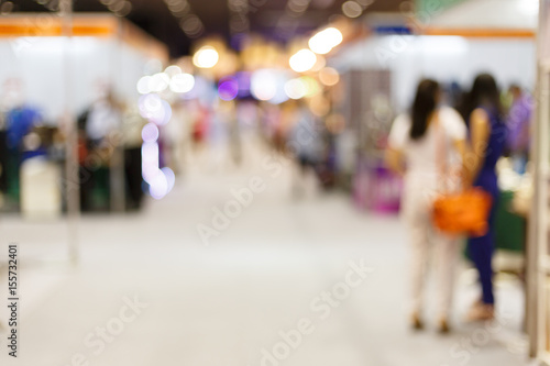 people customer shopping in hall exhibition trade fair, image blur used background