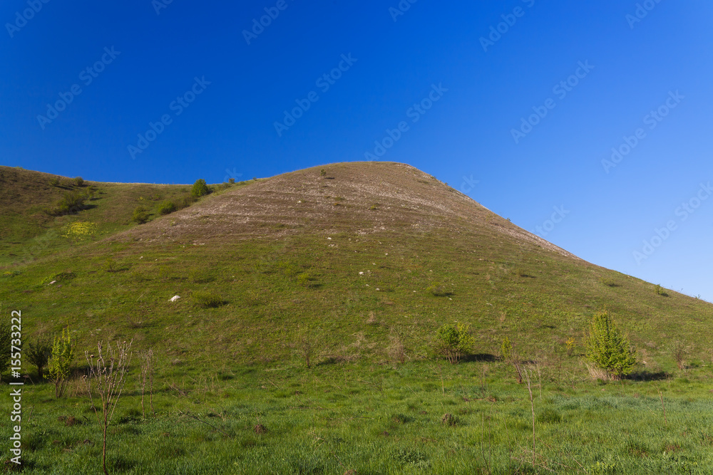 Fototapeta premium Ancient chalk mountains in central Russia. A landscape view of the peaks and hills.