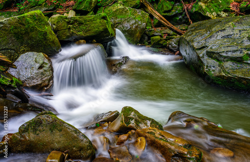 small cascade on the river among bouders