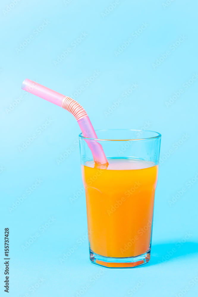 Fresh orange juice on blue background. Fresh orange juice on blue background.