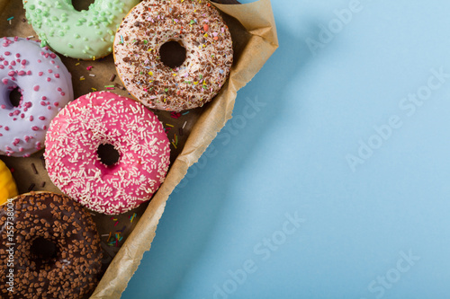 Colorful donuts on a blue background.