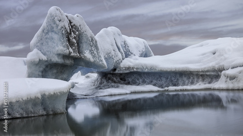 Melting glacier on water photo