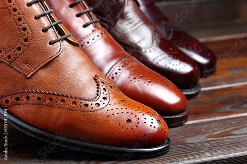 Fashion classical polished men's shades of brown oxford brogues.Selective focus