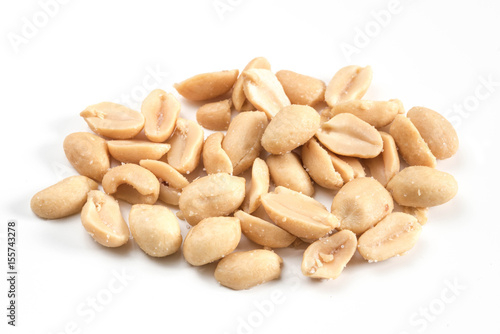 Arranged peeled peanuts, close-up view roasted salted peanuts isolated on white background