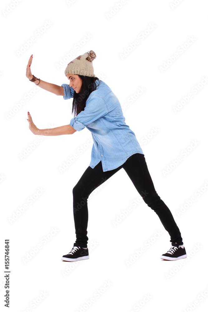 Woman pushing something imaginary over white Woman pushing something imaginary over white