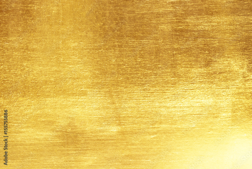 Fototapeta premium Shiny yellow leaf gold foil texture