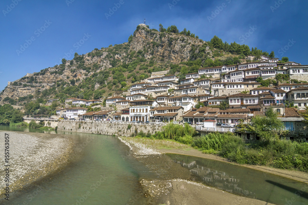 Albania - Berat - Traditional ottoman houses in Berat old town (called mangalem district) of berat, listed as UNESCO world heritage site, along with river Osum bank