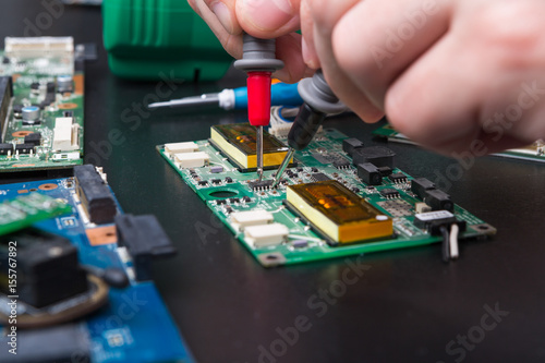 Electronic circuit board inspecting close up