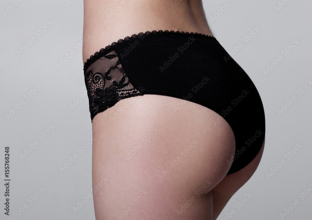 Close up of slim fit healthy girl in black panties Stock Photo