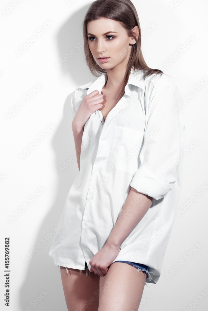 Beautiful young fashion model with white shirt Beautiful young fashion model with white shirt