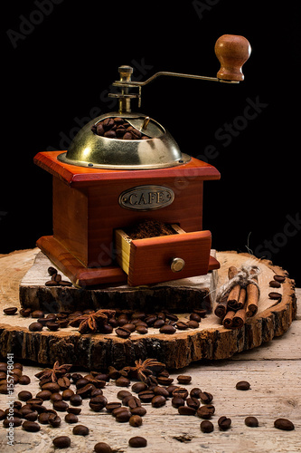 still life with coffee beans and old coffee mill