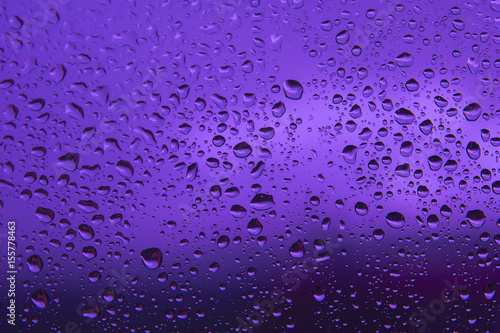 Water drops on Purple background