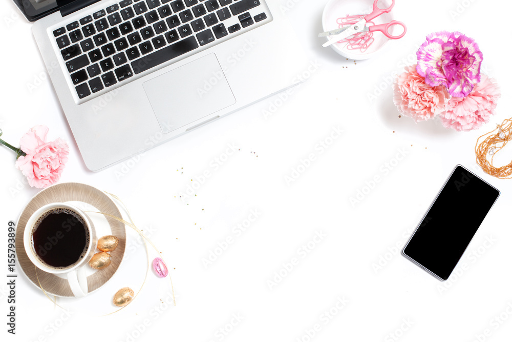 White, gold and pink womens office desk table with a lot of things on it. Top view with copy space. White, gold and pink womens office desk table with a lot of things on it. Top view with copy space.