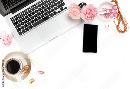White, gold and pink womens office desk table with a lot of things on it. Top view with copy space.