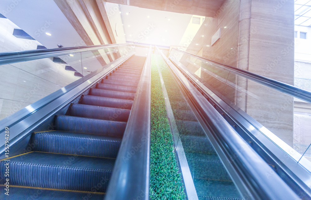 Fototapeta premium Blurry modern escalator