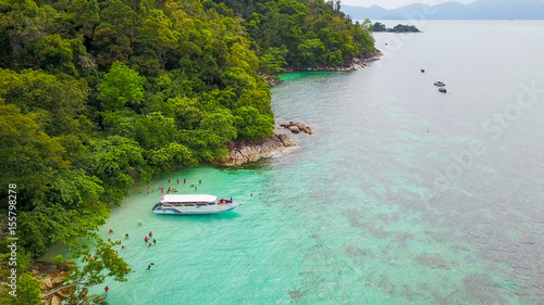 Aerial view over speed boat with beautiful sea and beach,Top view from drone, Koh Lipe island, Satun,Thailand © Goodvibes Photo