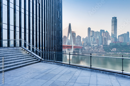 cityscape and skyline of chongqing on view from empty floor