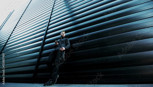 Hip business person in urban scene