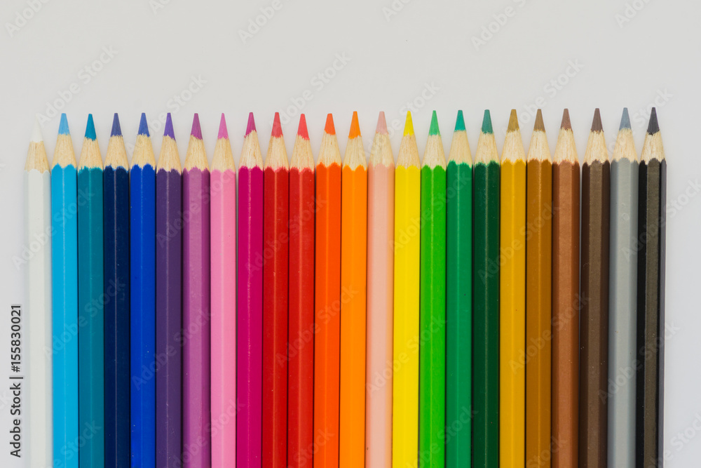 Colour pencils over white background. Shallow depth of field. Colour pencils over white background. Shallow depth of field.