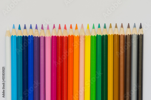 Colour pencils over white background. Shallow depth of field.