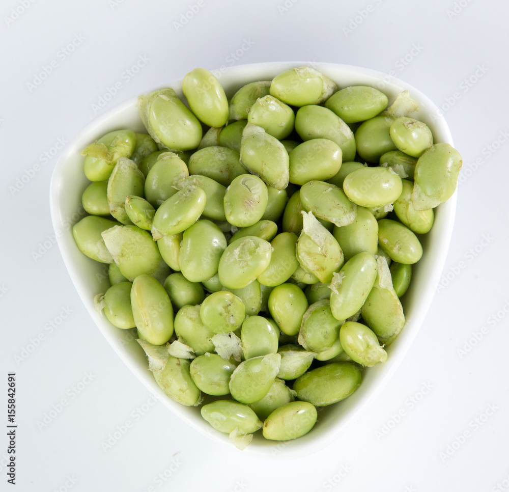 green soybeans in a bamboo basket isolated on white background
green soybeans in a bamboo basket isolated on white background