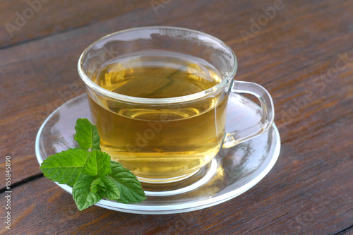 Glass cup of mint tea