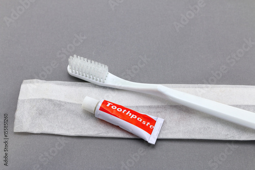 Hotel amenities kit on gray background