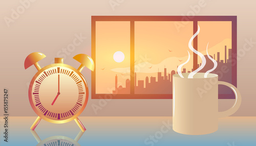 Alarm clock and mug of hot coffee near window at morning sunrise in big city.