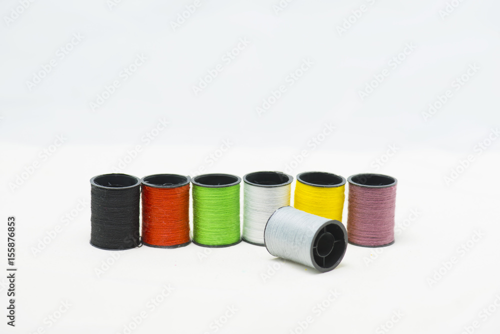 Colorful threads on white background Colorful threads on white background
