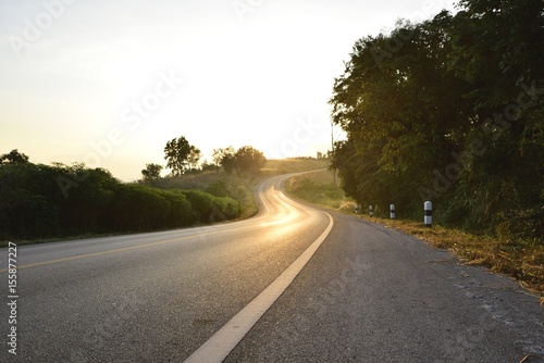 Hill and country road in morning photo