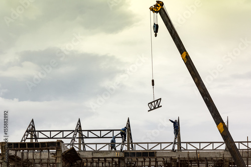 construction crane and workers