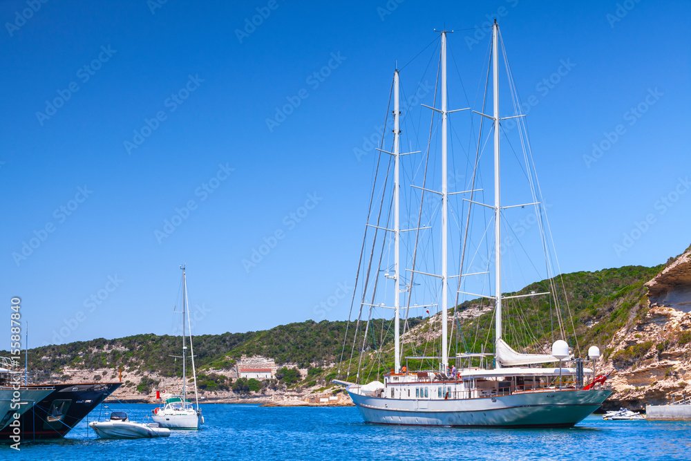 Sailing ship leaves the port of Bonifacio, Corsica
