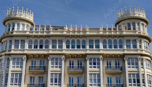 Typical building facade in coastal city of La Coruna, Spain